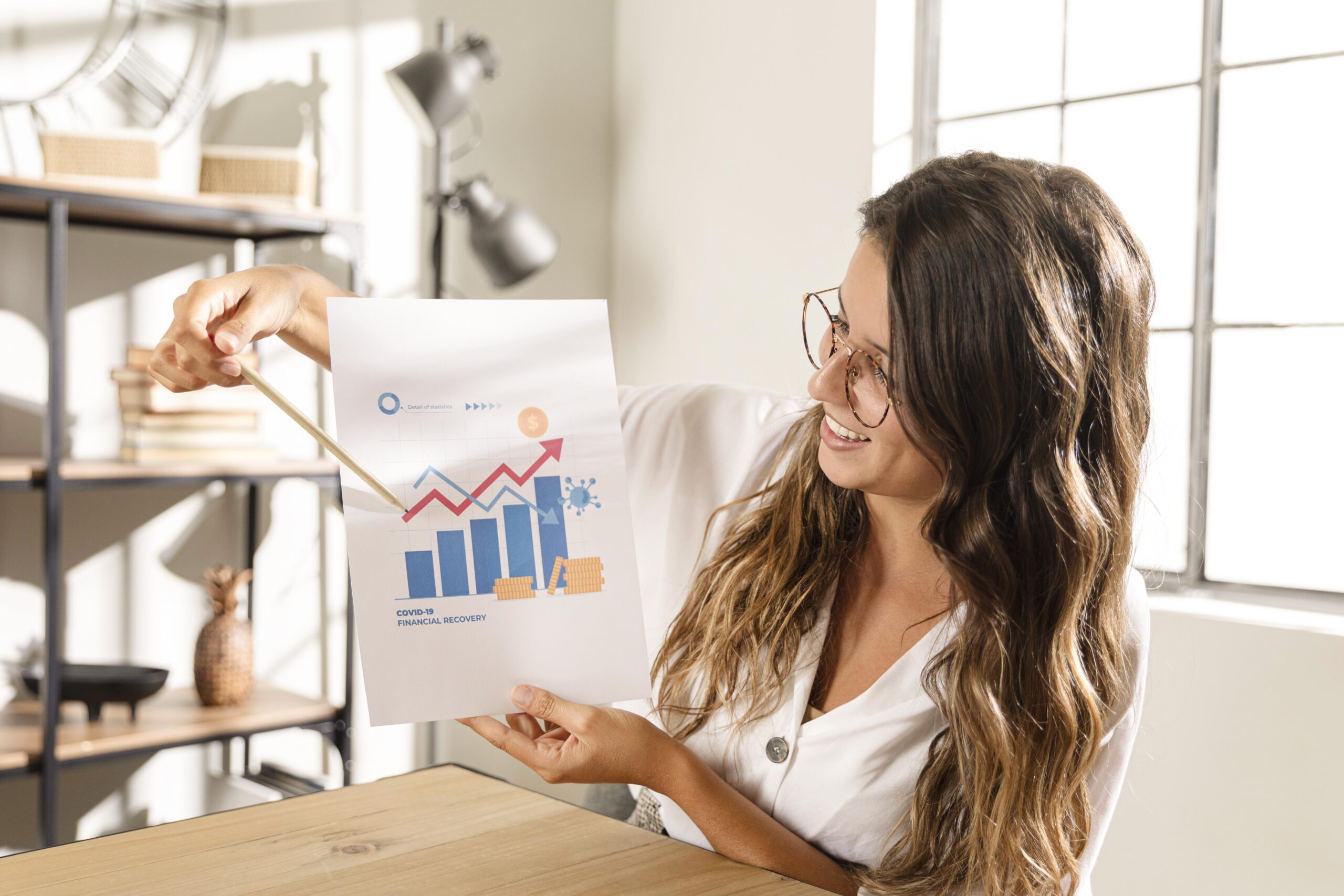 mid-shot-woman-showing-chart